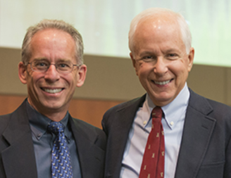 Douglas Diekema, MD, MPH (left), with Dr. Fost at the department’s first Annual Lecture in Bioethics.